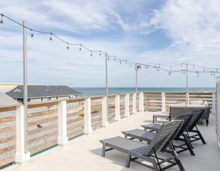 The rooftop terrace at Namastay at Terrace overlooks the ocean in Carolina Beach, N.C.