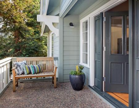 Front porch entrance with bench