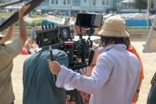 Film crew on beach