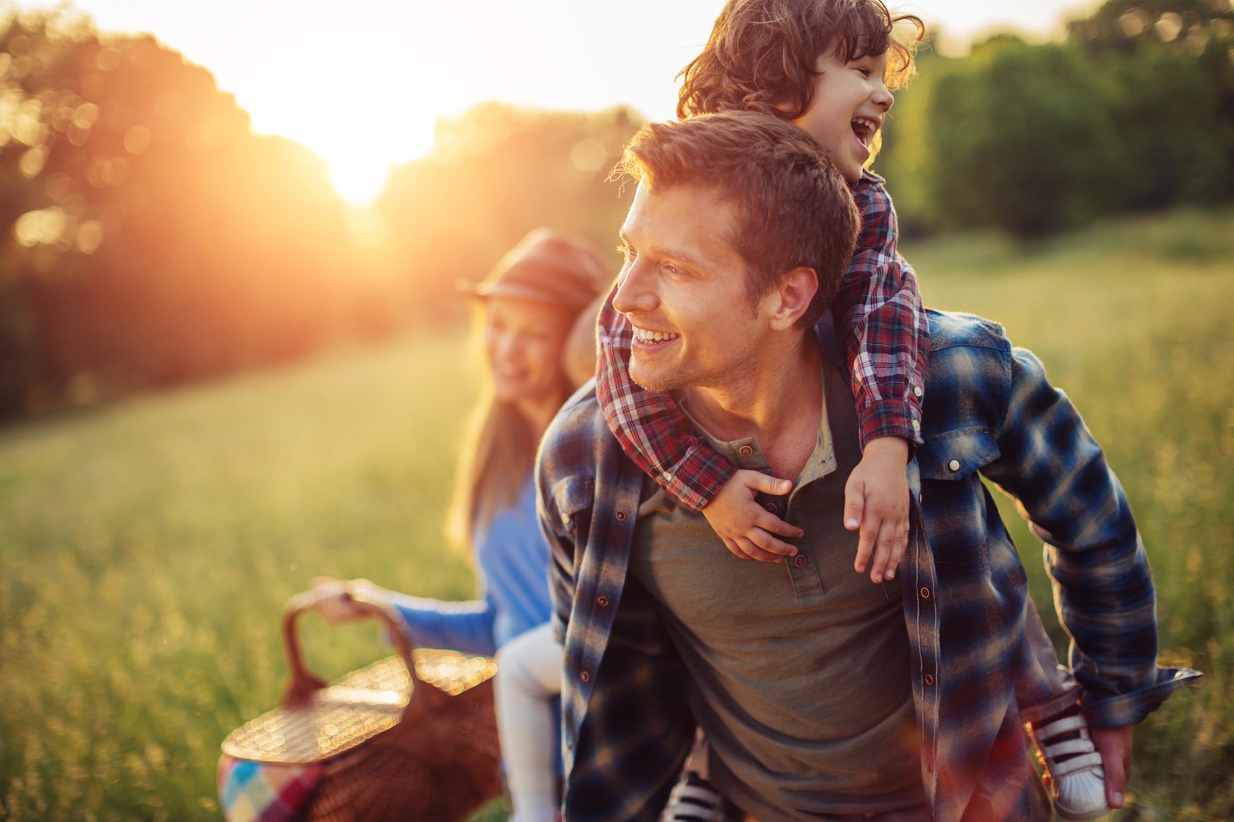 Family bringing a picnic to the park